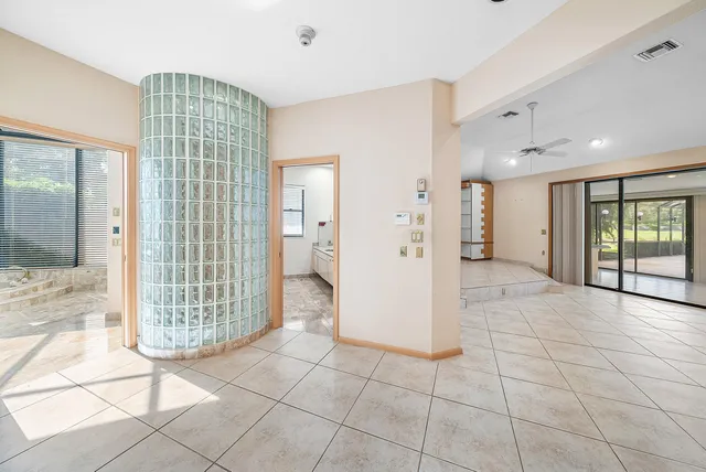 a bathroom with double sink and a mirror