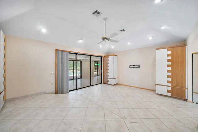 a kitchen with stainless steel appliances a sink and cabinets