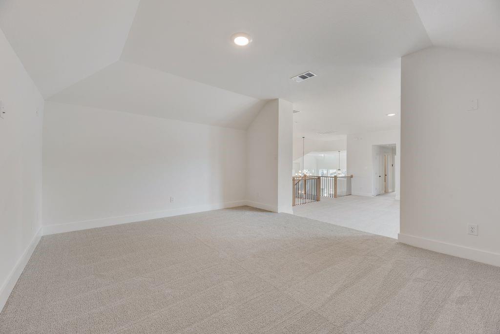 3517 Laurel Court Corinth, TX 76208 - Photo 25 of 30 a view of empty room with kitchen