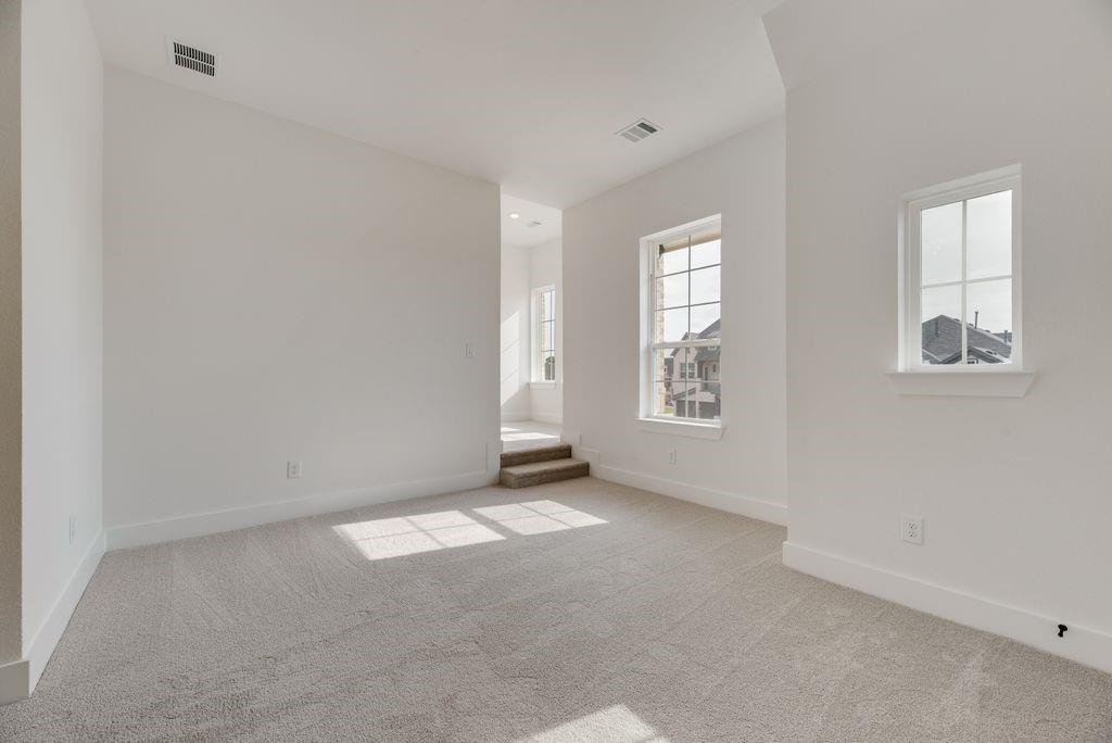 3517 Laurel Court Corinth, TX 76208 - Photo 26 of 30 an empty room with windows