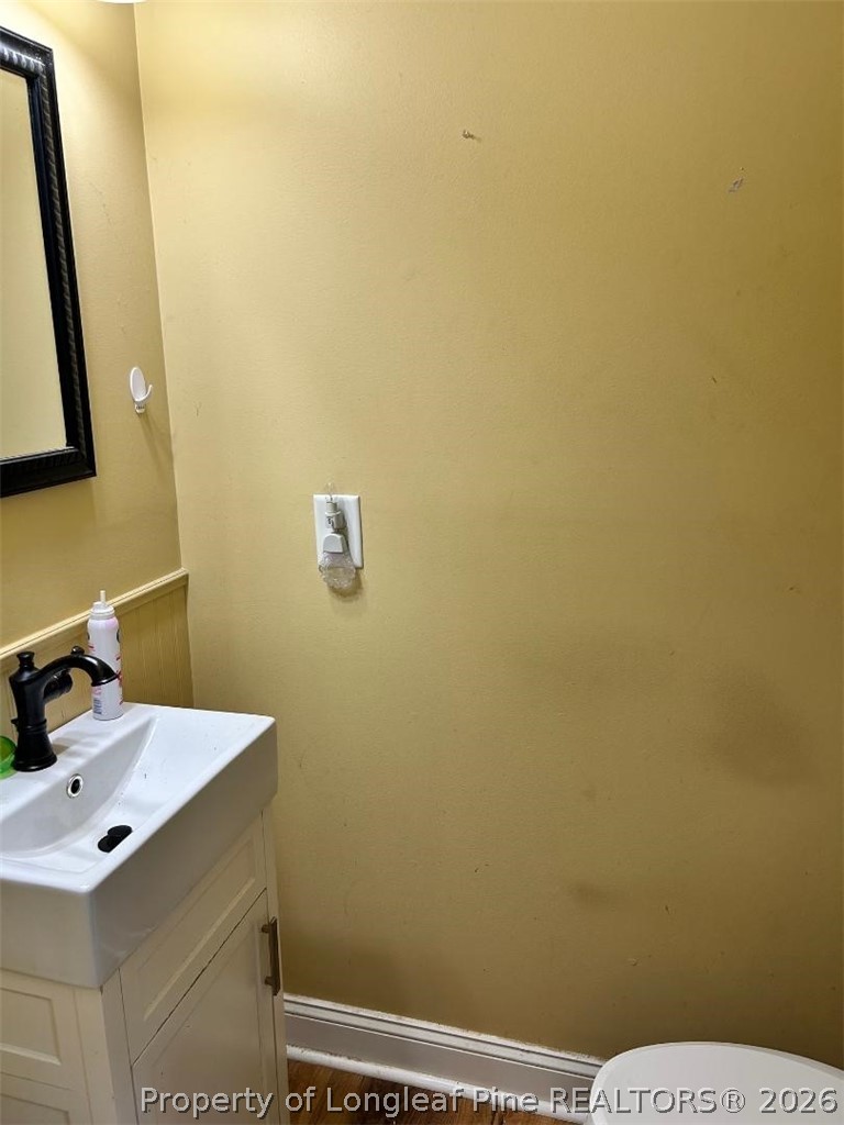 3085 Westminster Road Lumberton, NC 28360 - Photo 11 of 19 a bathroom with a sink and a mirror