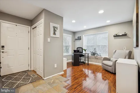 a living room with furniture and a table