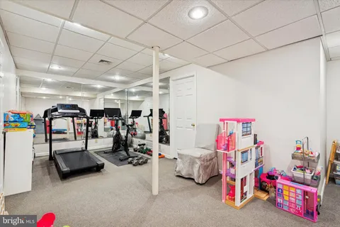 a storage room with gym equipment