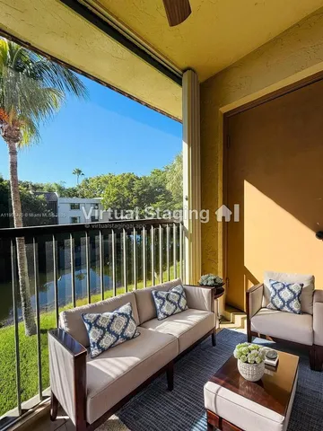 a bedroom with a bed lamp and a fireplace