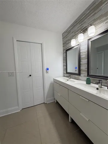 a view of swimming pool with an outdoor space and seating area