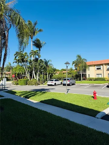 a view of swimming pool with outdoor seating