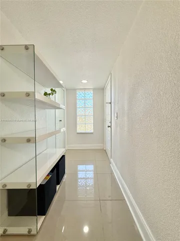a kitchen with stainless steel appliances granite countertop a sink and a stove