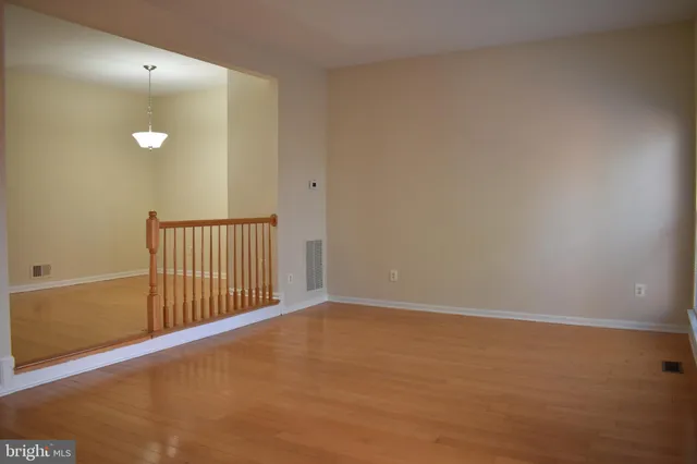a view of a livingroom with stairs