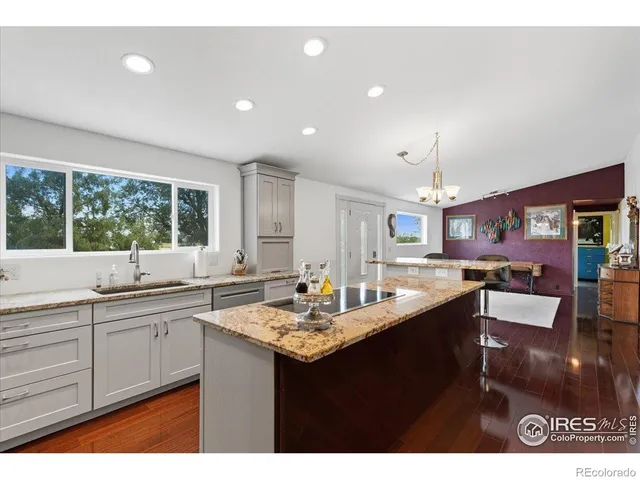 a view interior of a house and kitchen with stainless steel appliances