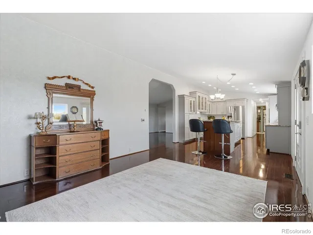 a bathroom with a sink a mirror and glass door