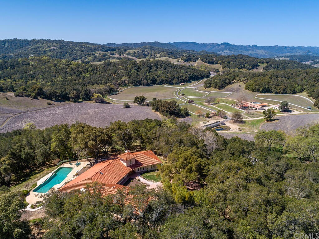 8800 Vineyard Drive Paso Robles, CA 93446 - Photo 2 of 74 a view of a lush green hillside and houses