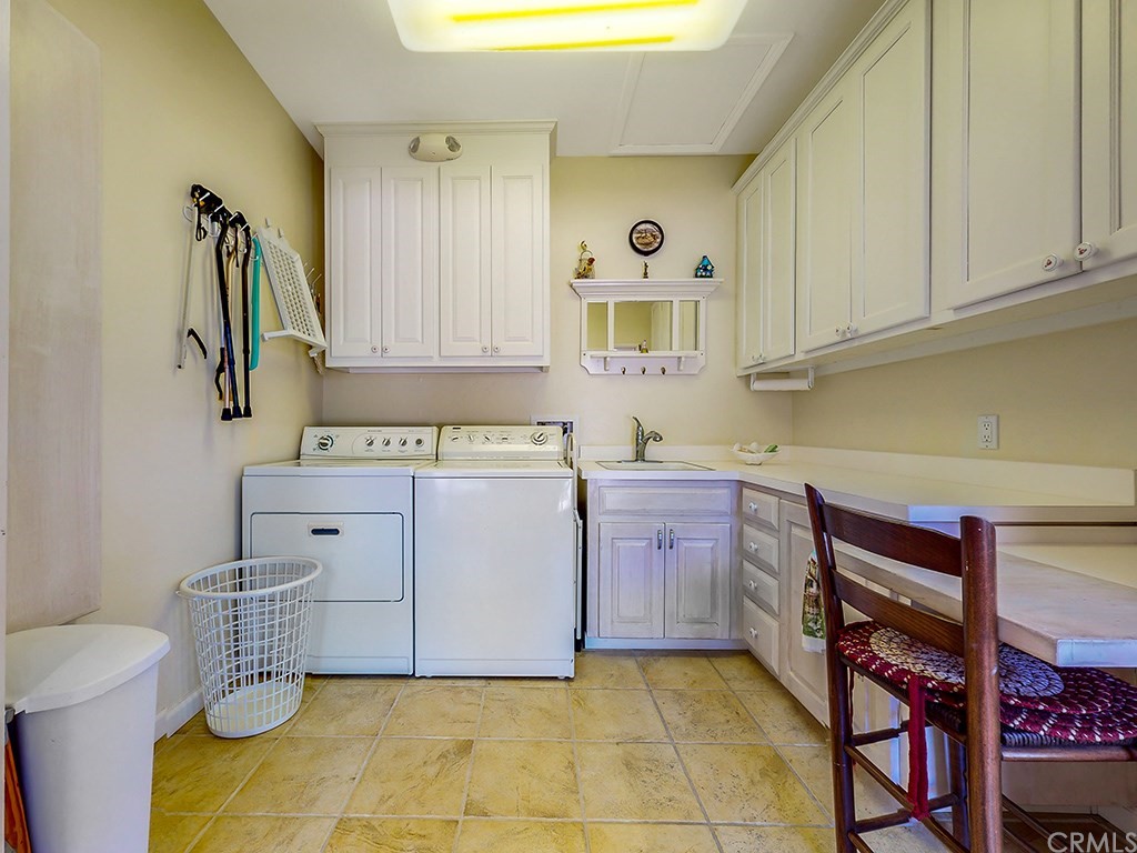 8800 Vineyard Drive Paso Robles, CA 93446 - Photo 38 of 74 a kitchen with a sink and a stove
