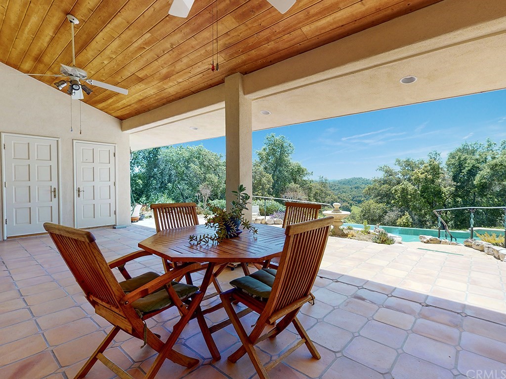 8800 Vineyard Drive Paso Robles, CA 93446 - Photo 40 of 74 a dining room with furniture and garden view