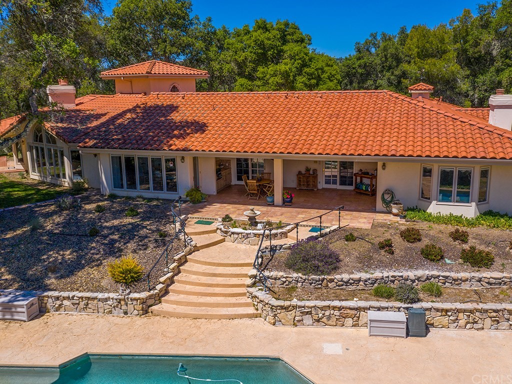 8800 Vineyard Drive Paso Robles, CA 93446 - Photo 44 of 74 a view of a house with swimming pool and furniture