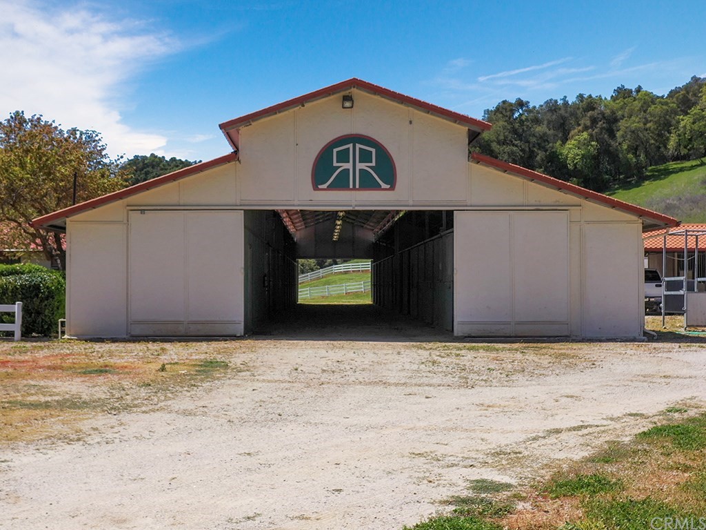 8800 Vineyard Drive Paso Robles, CA 93446 - Photo 46 of 74 a front view of a house with a yard and garage