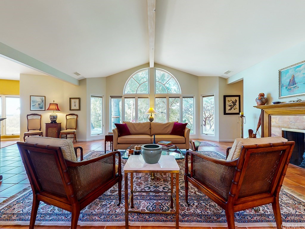 8800 Vineyard Drive Paso Robles, CA 93446 - Photo 6 of 74 a living room with furniture a table and a large window