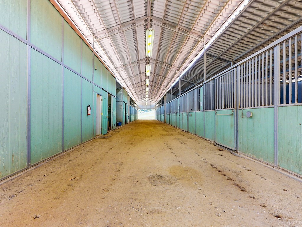 8800 Vineyard Drive Paso Robles, CA 93446 - Photo 51 of 74 Well maintained and well lighted stall area.