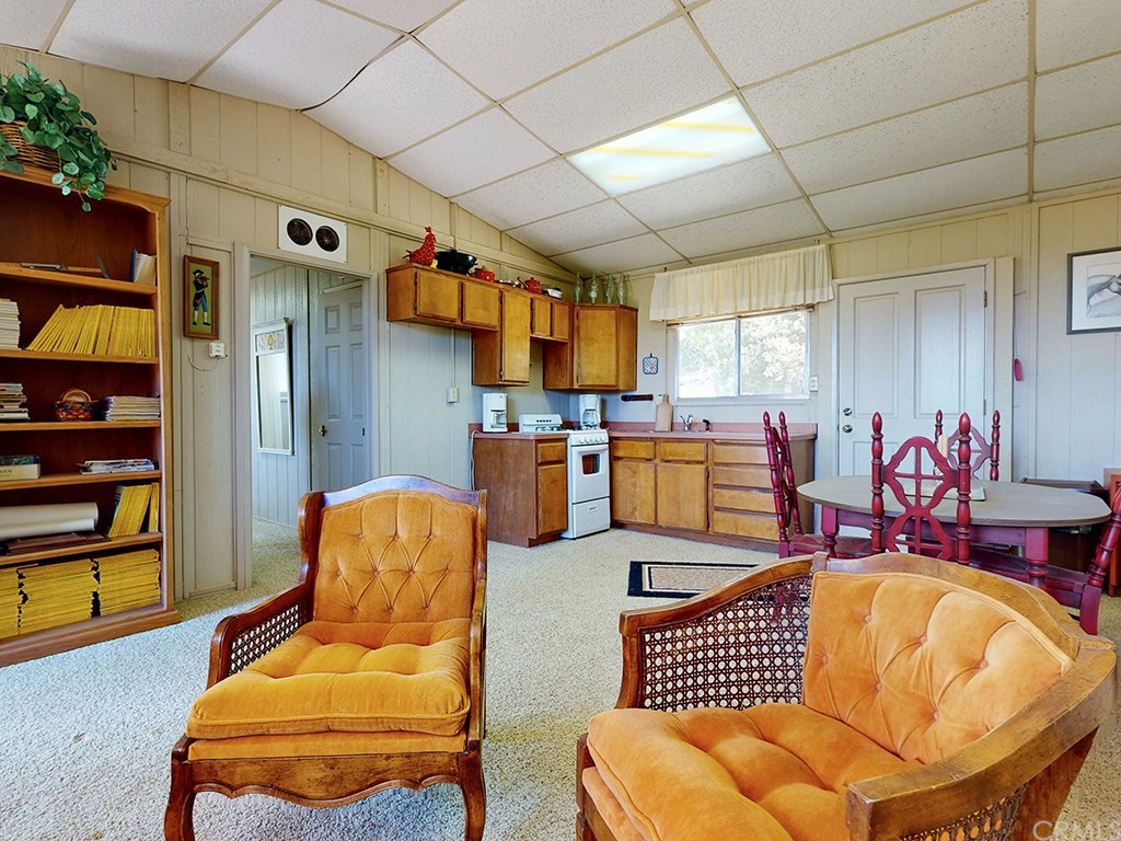8800 Vineyard Drive Paso Robles, CA 93446 - Photo 55 of 74 a living room with furniture and a kitchen area