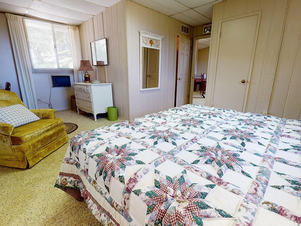 8800 Vineyard Drive Paso Robles, CA 93446 - Photo 57 of 74 a bedroom with bed and window