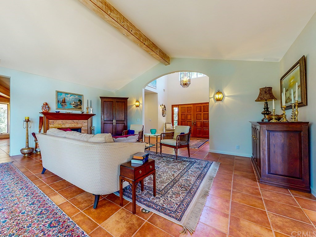 8800 Vineyard Drive Paso Robles, CA 93446 - Photo 8 of 74 This view of the living room faces the front entrance, foyer with it's 15 foot ceilings allowing for abundant light through the upper windows.