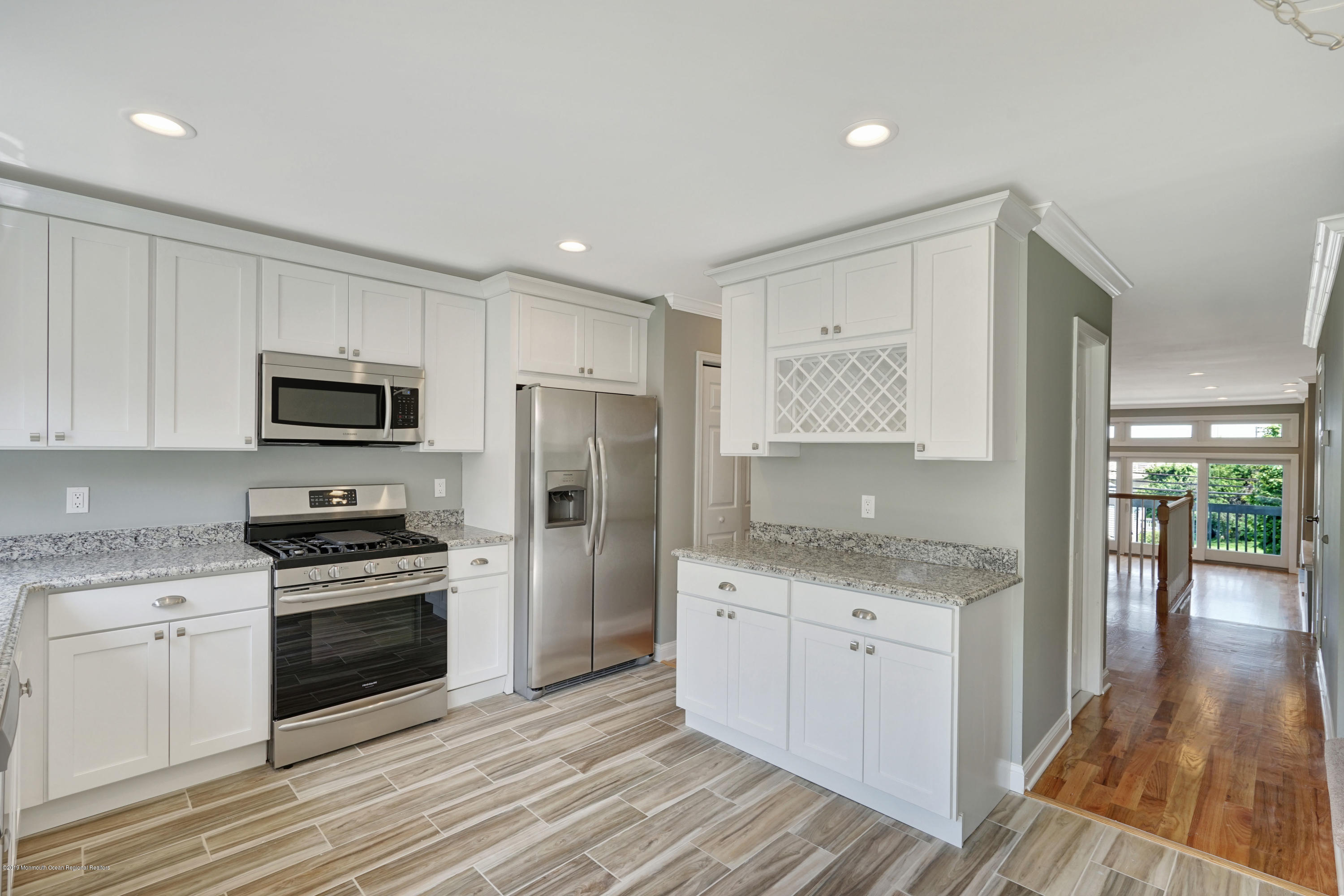 Additional Cabinets featuring wine rack