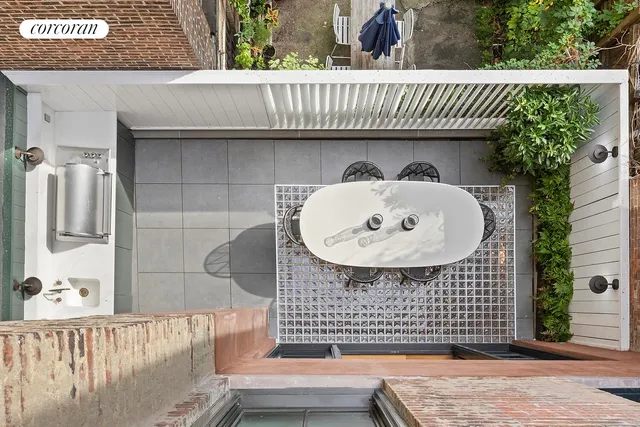 a kitchen with a sink cabinets and appliances