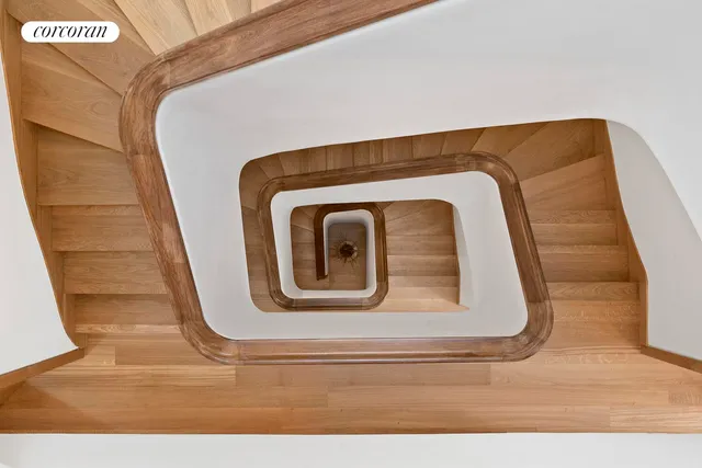 a view of a patio with a table and chairs