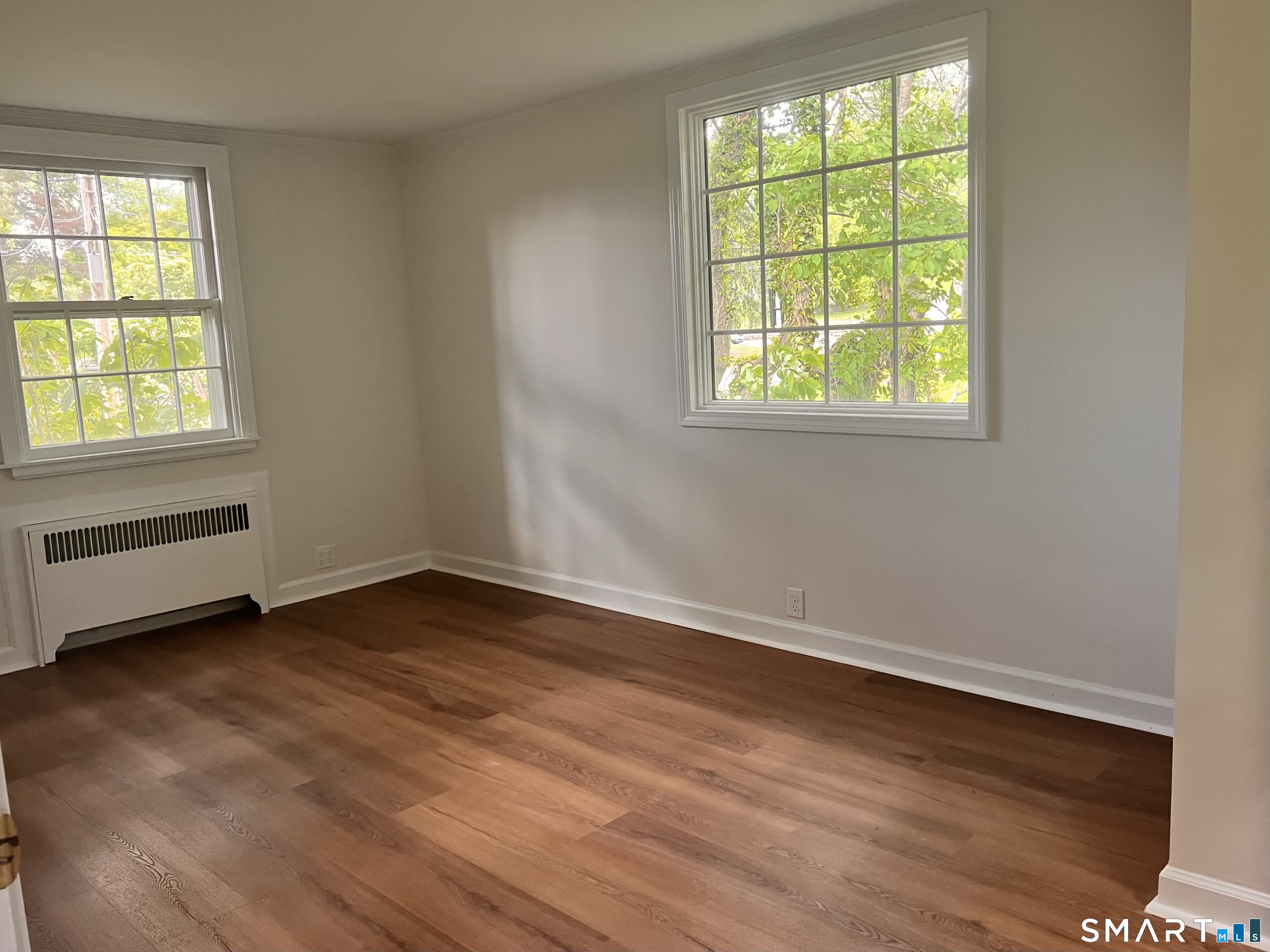 23 Norway Road North Haven, CT 06473 - Photo 17 of 32 an empty room with wooden floor and windows