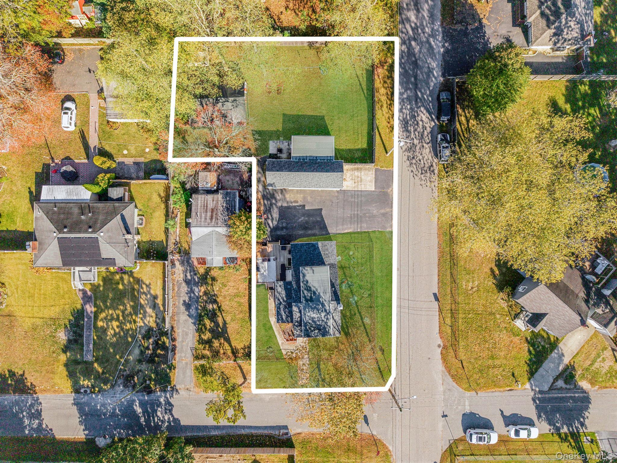 267 Dogwood Road West Mastic Beach, NY 11951 - Photo 14 of 30 an aerial view of residential houses with outdoor space