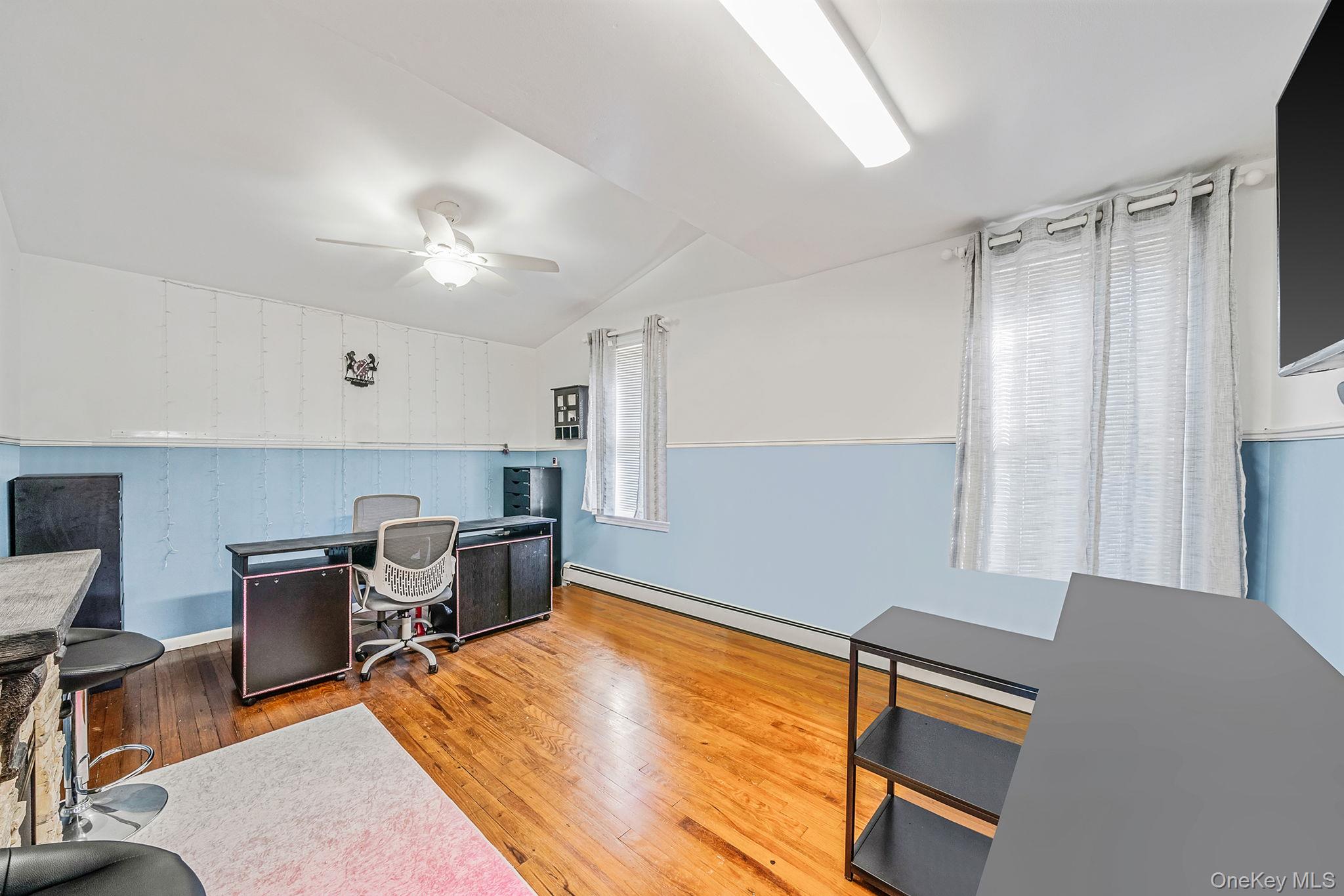 267 Dogwood Road West Mastic Beach, NY 11951 - Photo 23 of 30 a livingroom with workspace and a window