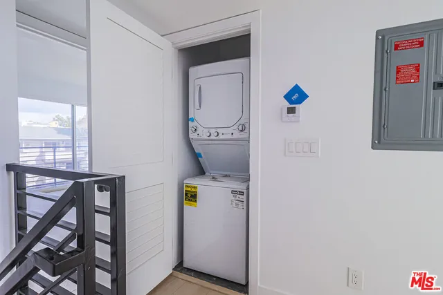 a view of a house with stairs and wooden floor