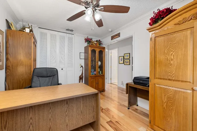 a bathroom with a sink toilet and a mirror