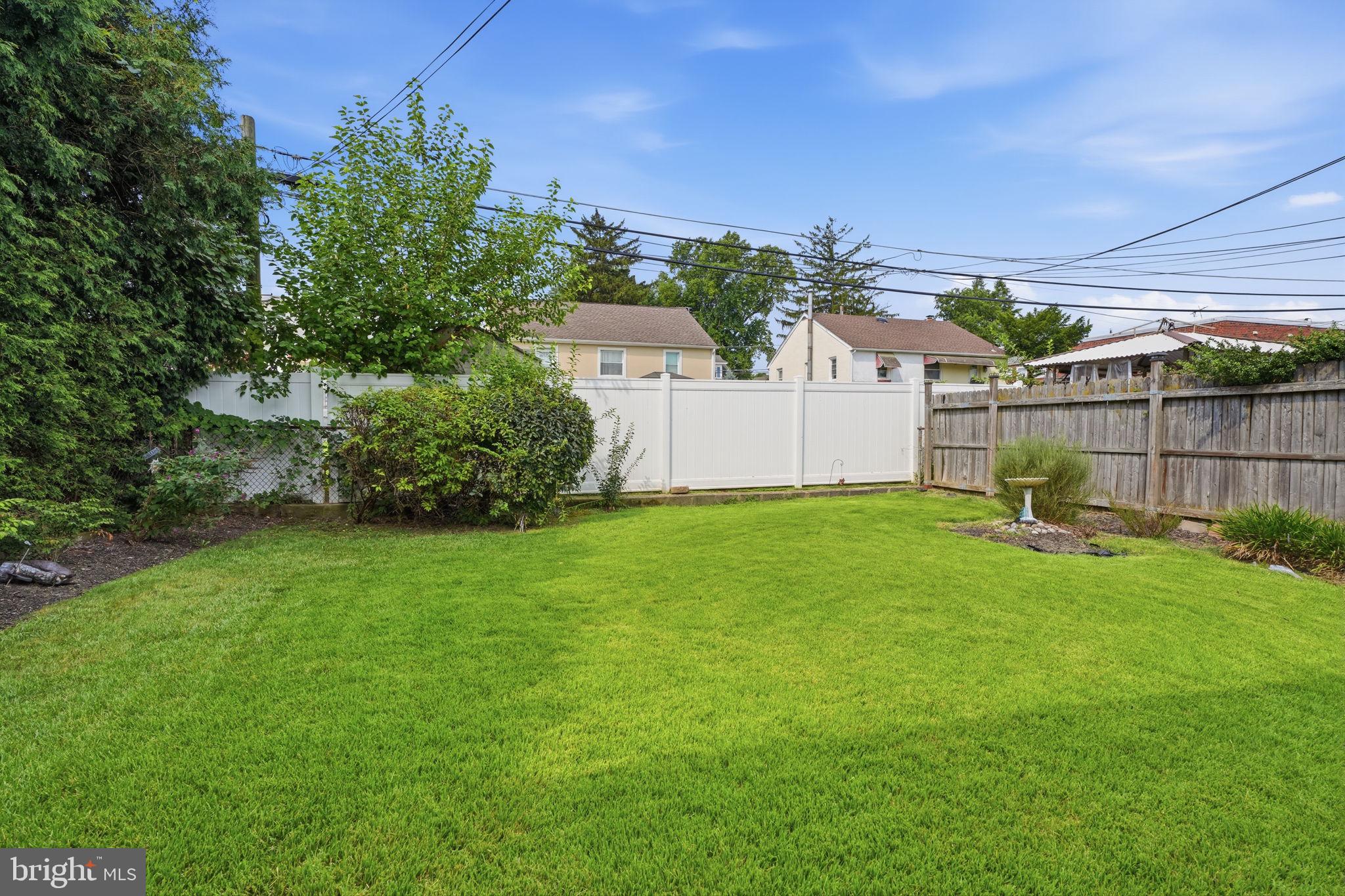 2012 Tomlinson Road Philadelphia, PA 19116 - Photo 32 of 33 Lush green yard with serene privacy.