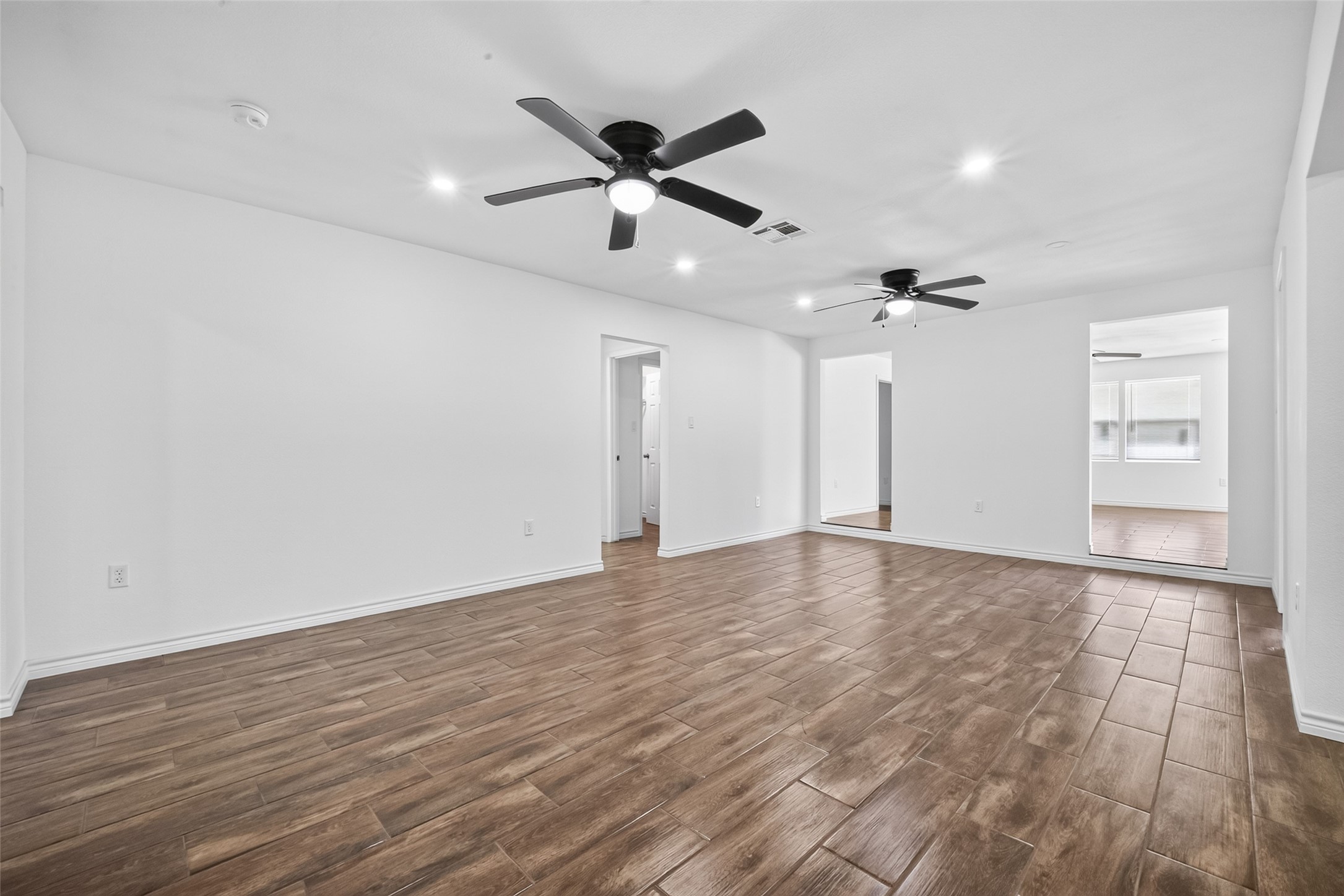 3530 Rosedale Street Houston, TX 77004 - Photo 20 of 50 Enjoy seamless flow throughout the home with a continuous open floor design.