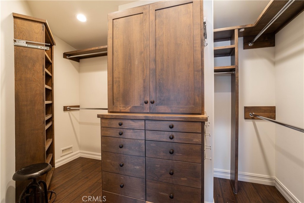 33791 Granada Drive Dana Point, CA 92629 - Photo 26 of 75 a view of walk in closet with clothes and shoes