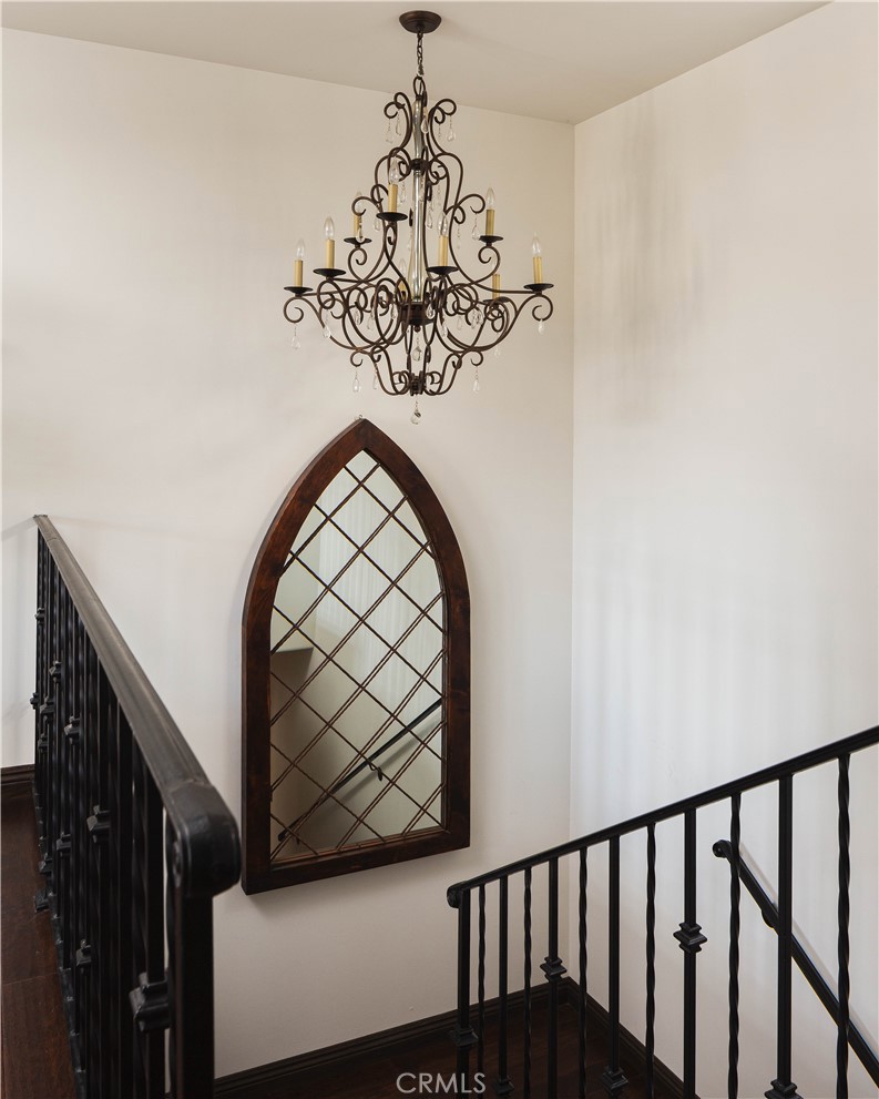 33791 Granada Drive Dana Point, CA 92629 - Photo 28 of 75 a view of a hallway with wooden floor and staircase