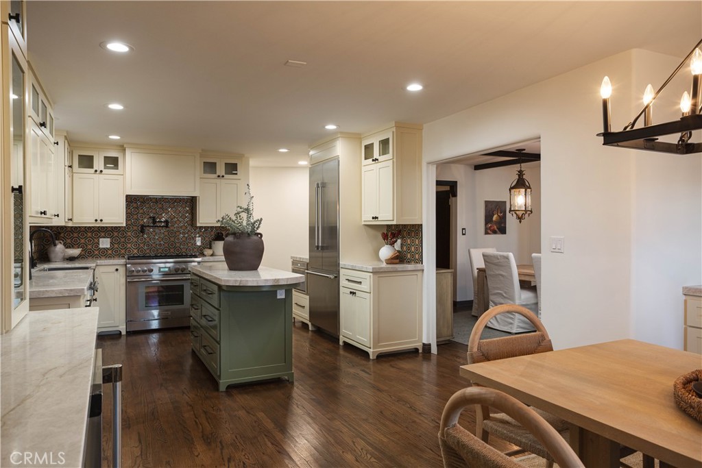 33791 Granada Drive Dana Point, CA 92629 - Photo 38 of 75 a kitchen that has a lot of cabinets a sink and appliances in it