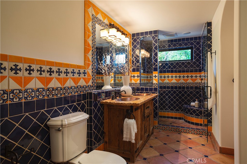 33791 Granada Drive Dana Point, CA 92629 - Photo 41 of 75 a bathroom with a toilet a sink and a shower
