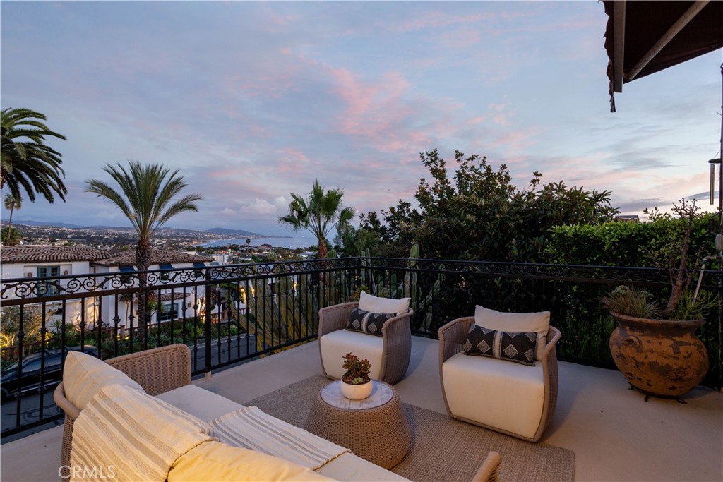 33791 Granada Drive Dana Point, CA 92629 - Photo 66 of 75 a view of a patio with couches potted plants and ocean view