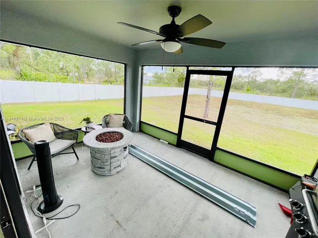 a very nice looking dining room with a large window