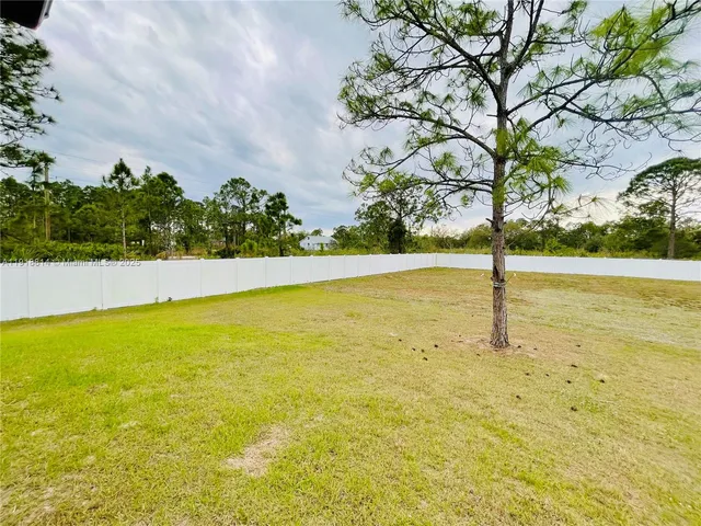 a view of a house with a swimming pool