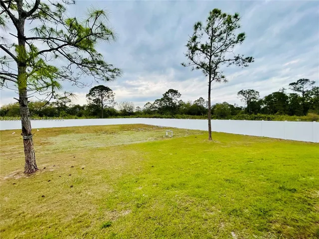 a front view of a house with swimming pool