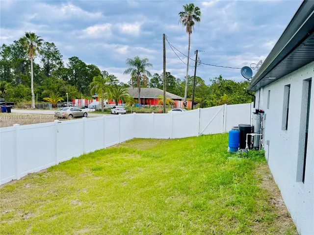a view of an outdoor space and swimming pool