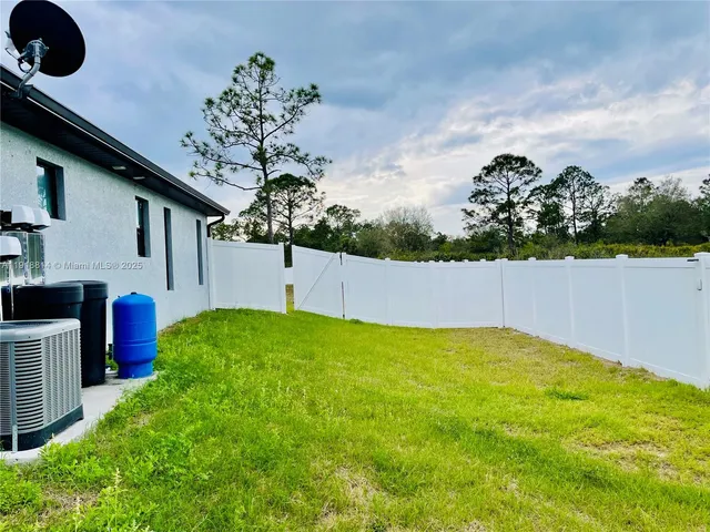 a swimming pool with a yard