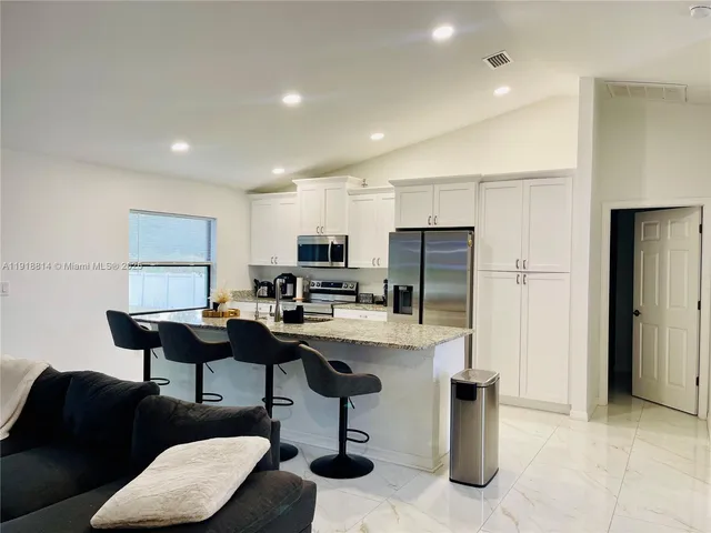 a workspace with furniture and a couch