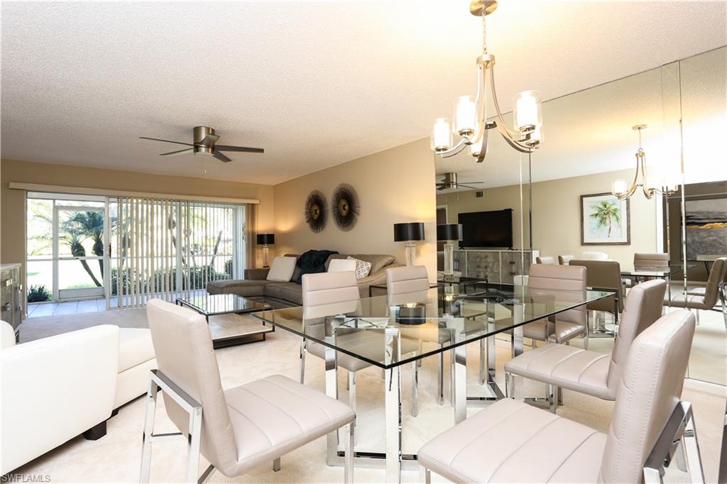 5908 Cranbrook Way, Unit I103 Naples, FL 34112 - Photo 11 of 26 a view of a dining room and livingroom view