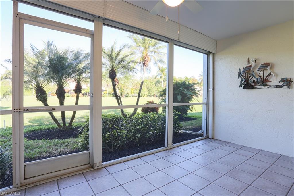 5908 Cranbrook Way, Unit I103 Naples, FL 34112 - Photo 18 of 26 a view of a large window with an outdoor space