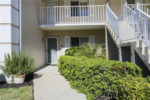 a front view of a house with a porch