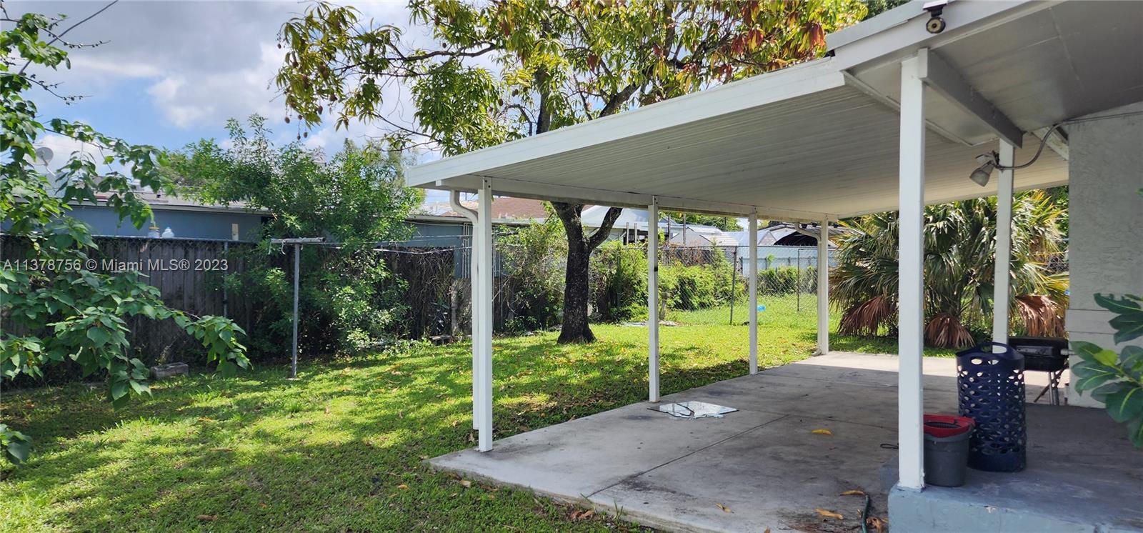 Gladeview Miami, FL 33147 - Photo 3 of 7 a view of a house with backyard and porch