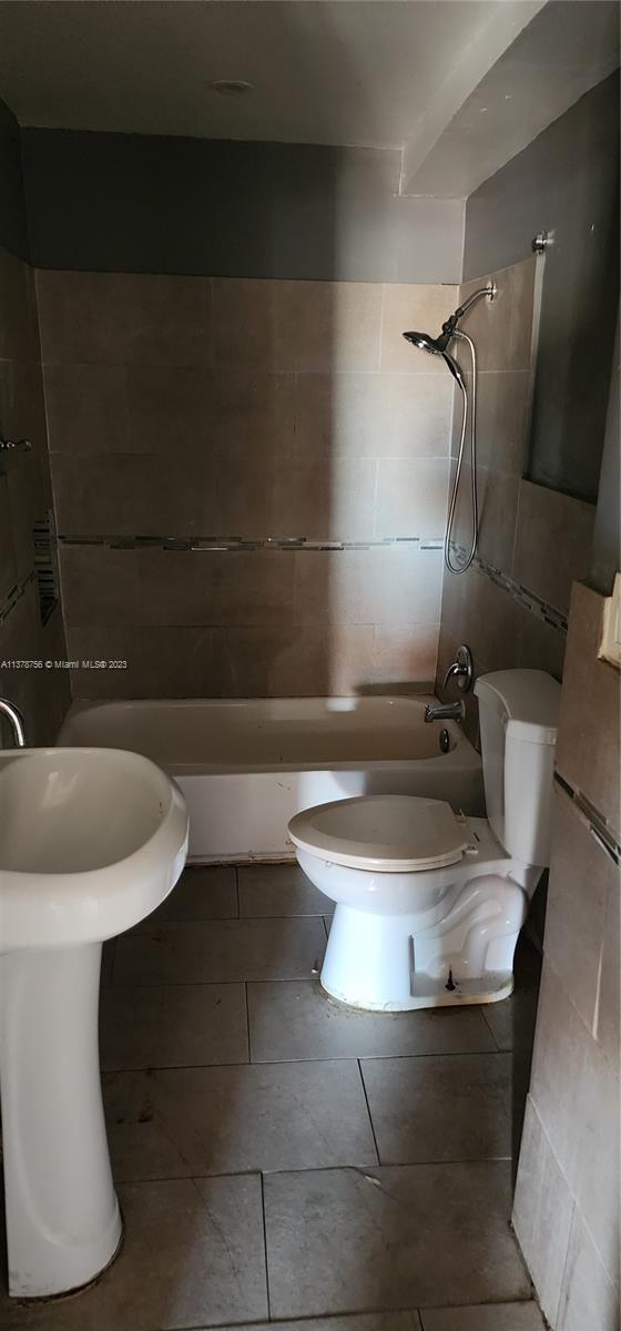 Gladeview Miami, FL 33147 - Photo 7 of 7 a bathroom with a sink and mirror